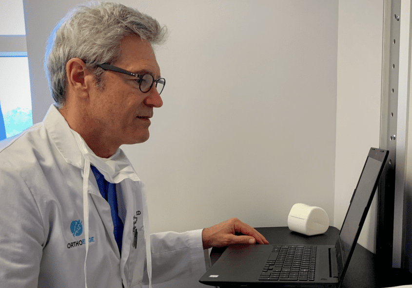 Dr. Grimsley Conducting a Telemedicine Visit OrthoEdge Orthopedic Specialists Jacksonville Florida ortho edge fl